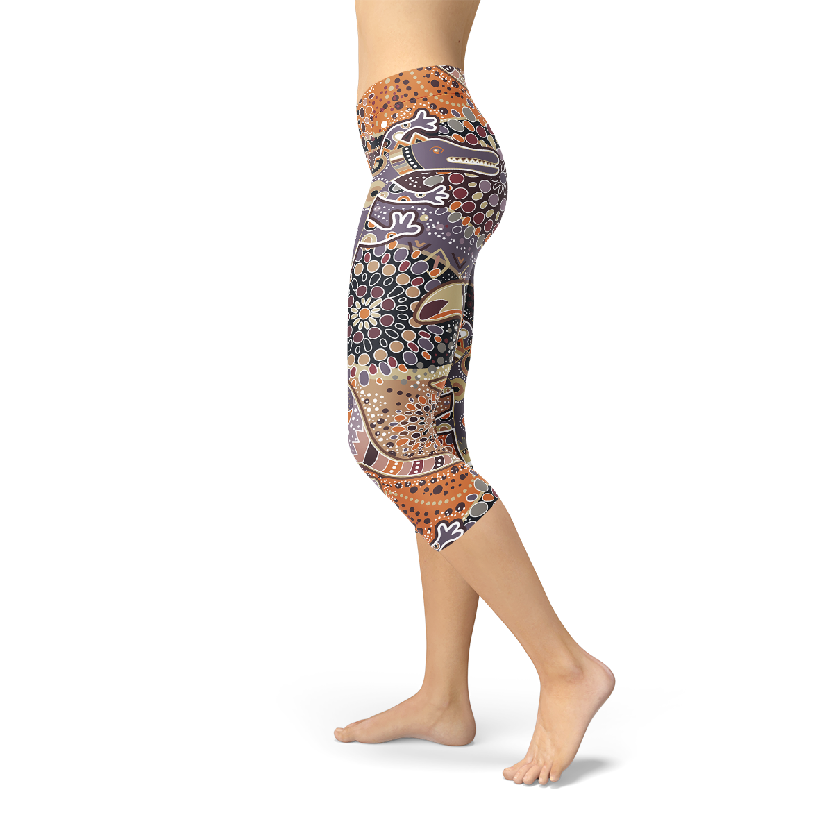 Womens Aboriginal Dreamtime Capri Leggings featuring a vibrant, colorful design inspired by Aboriginal culture, made from high-performance fabric for comfort and style.