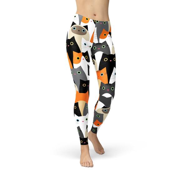 Women's leggings featuring a vibrant all-over cat print design, made from a comfortable and stretchy fabric blend, ideal for workouts and casual wear.