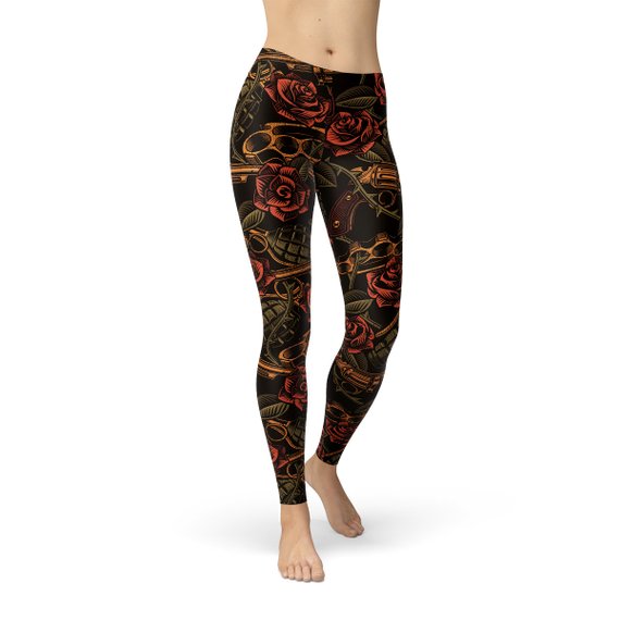 Women's Badass Leggings featuring bold graphic design with revolvers, grenades, and roses, perfect for workouts.