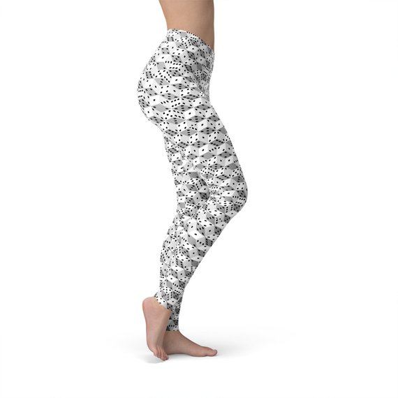 Womens Black and White Dice Leggings showcasing a unique graphic design, perfect for workouts and casual wear.