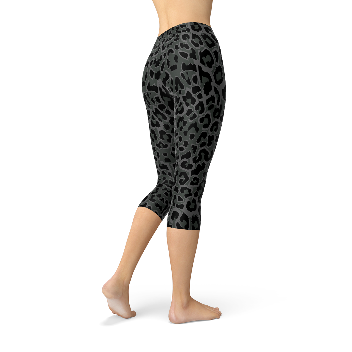 Women's Black Capri Leggings featuring a vibrant leopard spots print, designed for comfort and performance, perfect for workouts and casual wear.