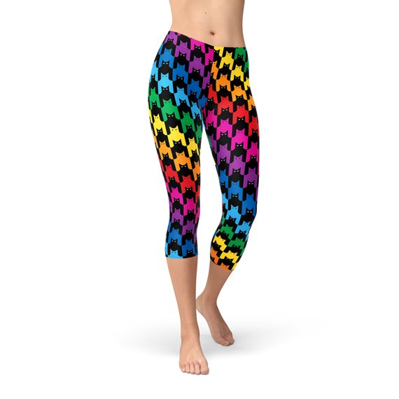 A pair of Women's Cat Houndstooth Capri Leggings featuring a stylish houndstooth pattern, designed for comfort and performance in various athletic activities.