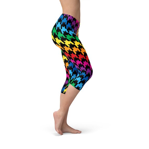 A pair of Women's Cat Houndstooth Capri Leggings featuring a stylish houndstooth pattern, designed for comfort and performance in various athletic activities.