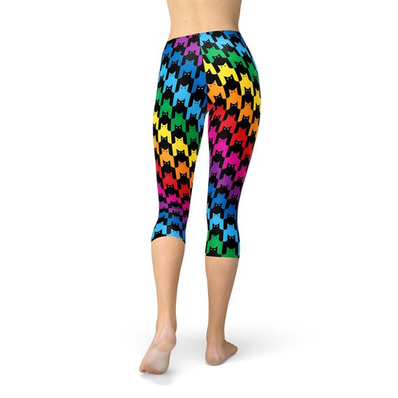 A pair of Women's Cat Houndstooth Capri Leggings featuring a stylish houndstooth pattern, designed for comfort and performance in various athletic activities.