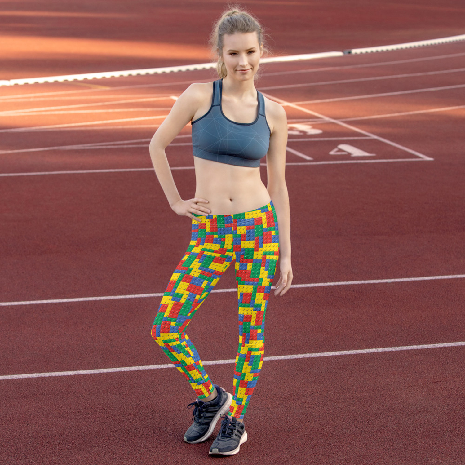 A pair of vibrant Womens Colorful Building Blocks Leggings featuring unique graphic designs, perfect for workouts and casual wear.