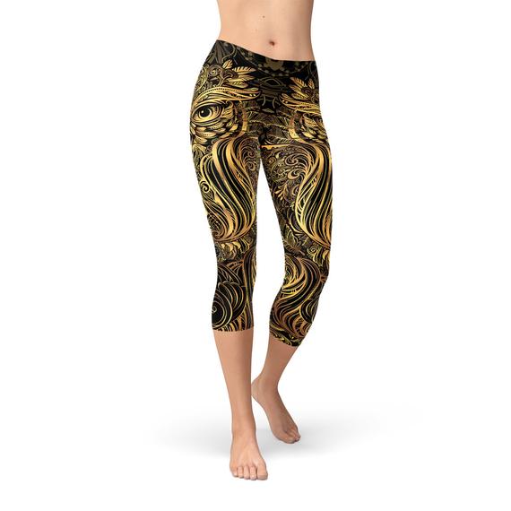 Womens Golden Ornament Owl Capri Leggings featuring a unique golden owl design, perfect for workouts and casual wear.