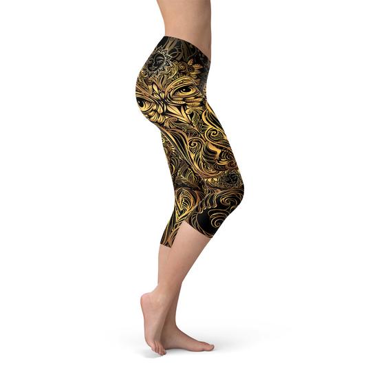 Womens Golden Ornament Owl Capri Leggings featuring a unique golden owl design, perfect for workouts and casual wear.