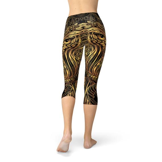 Womens Golden Ornament Owl Capri Leggings featuring a unique golden owl design, perfect for workouts and casual wear.