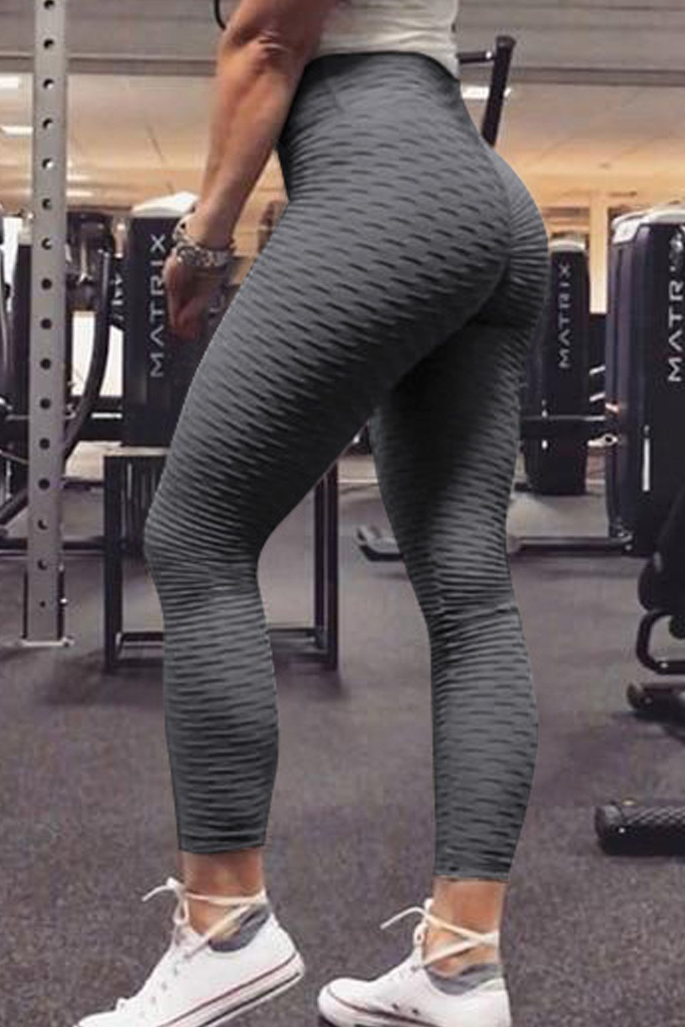 Women's gray high waist sport leggings designed for comfort and shaping, featuring a stylish cut and special nubs for skin massage.