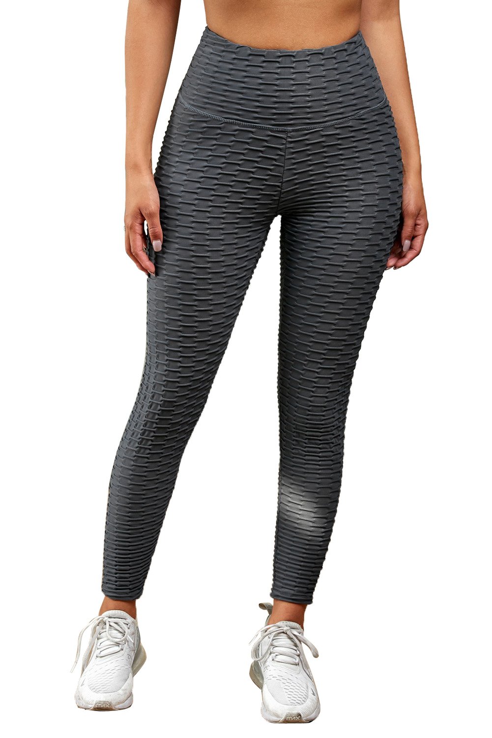 Women's gray high waist sport leggings designed for comfort and shaping, featuring a stylish cut and special nubs for skin massage.