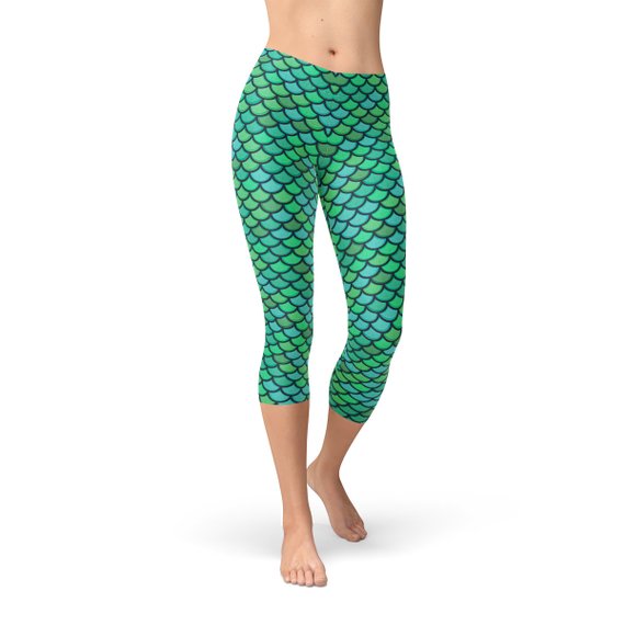 Womens Green Mermaid Capri Leggings showcasing unique mermaid design, perfect for workouts and casual wear, made from breathable and stretchy fabric.