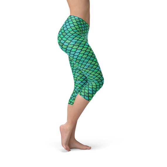 Womens Green Mermaid Capri Leggings showcasing unique mermaid design, perfect for workouts and casual wear, made from breathable and stretchy fabric.