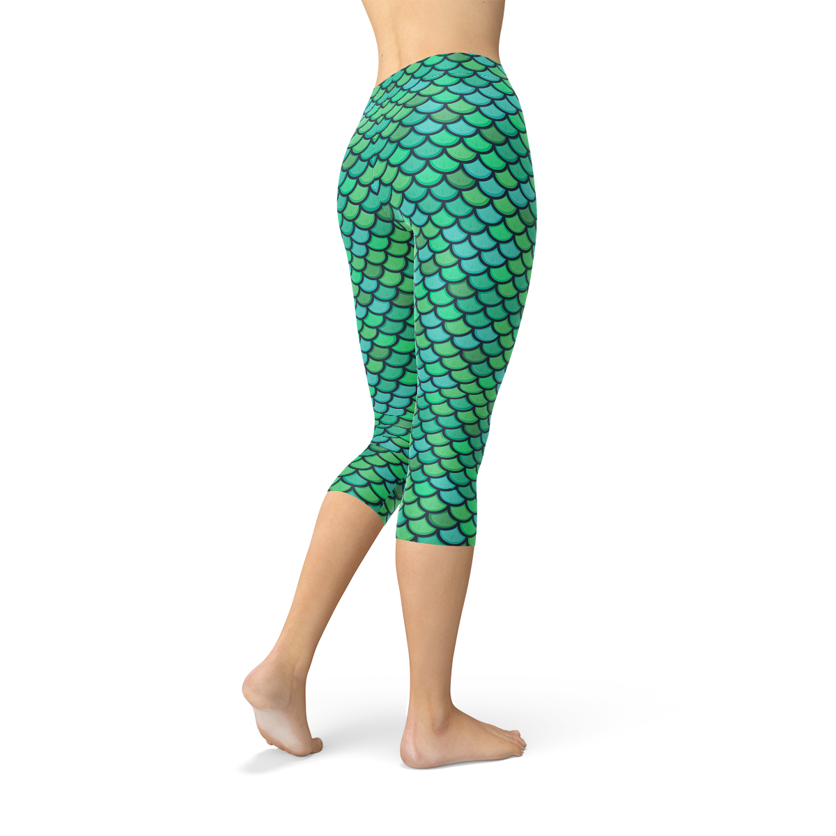 Womens Green Mermaid Capri Leggings showcasing unique mermaid design, perfect for workouts and casual wear, made from breathable and stretchy fabric.