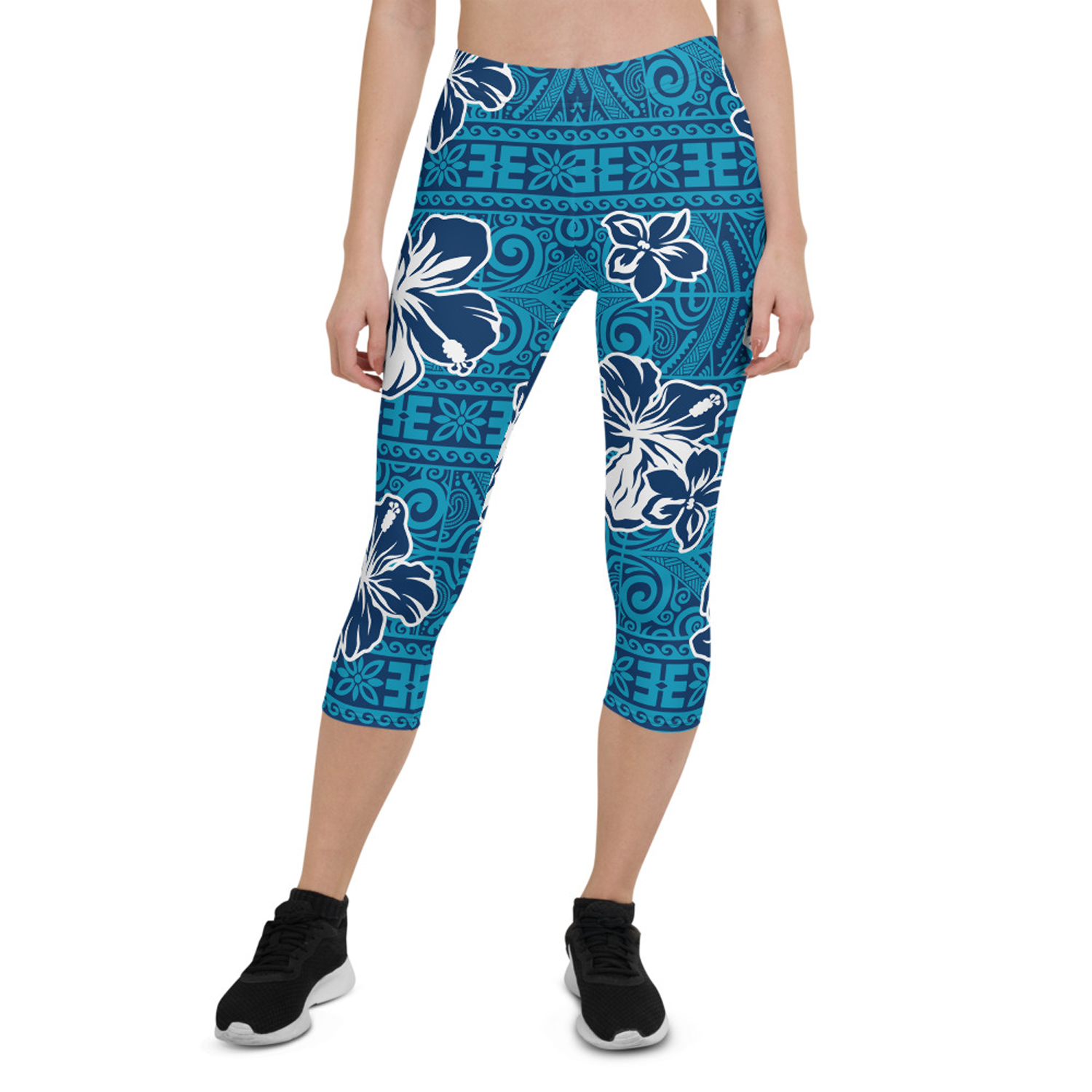 Women's Hawaii Hibiscus Blue Floral Capri Leggings featuring a vibrant floral design, perfect for workouts and casual wear.