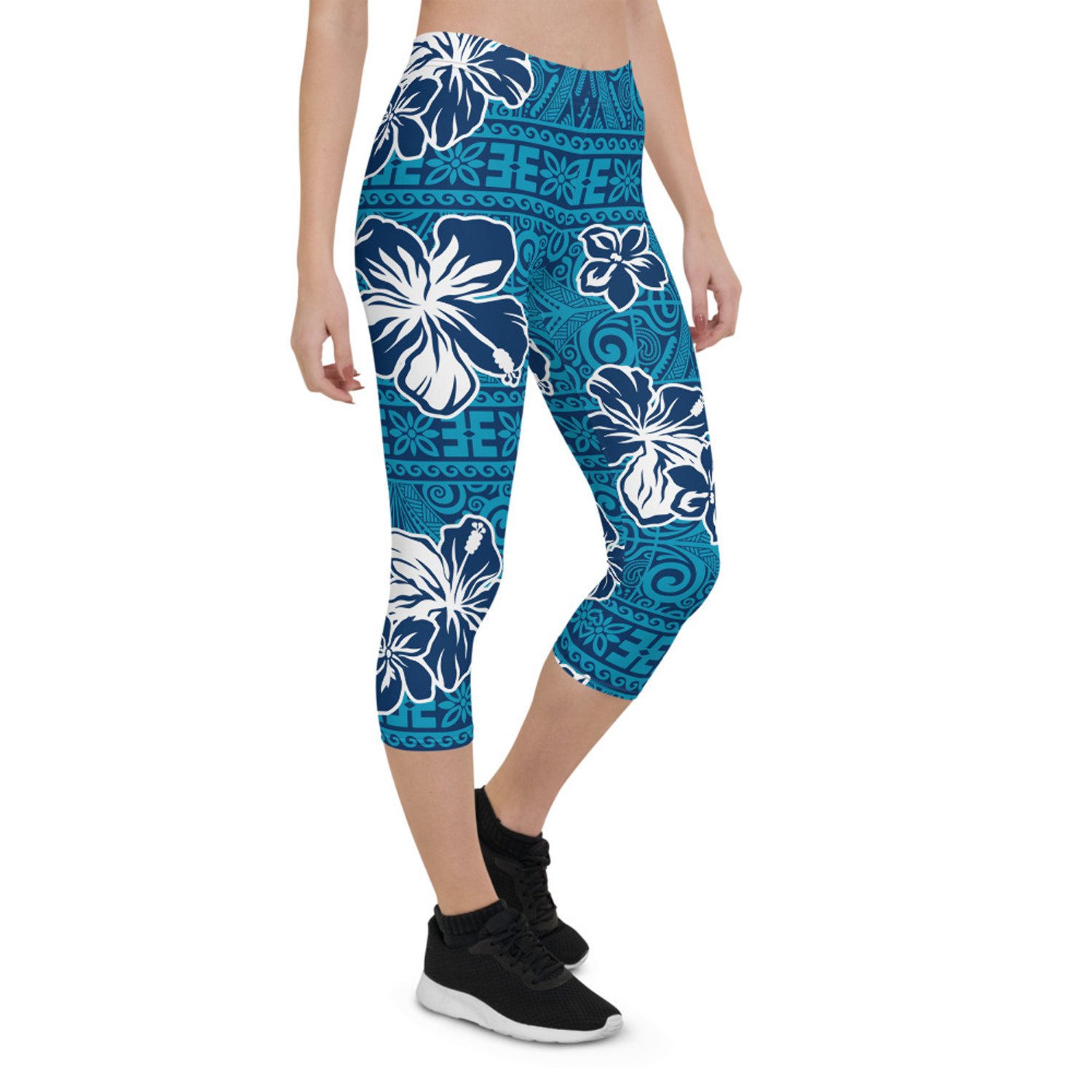 Women's Hawaii Hibiscus Blue Floral Capri Leggings featuring a vibrant floral design, perfect for workouts and casual wear.