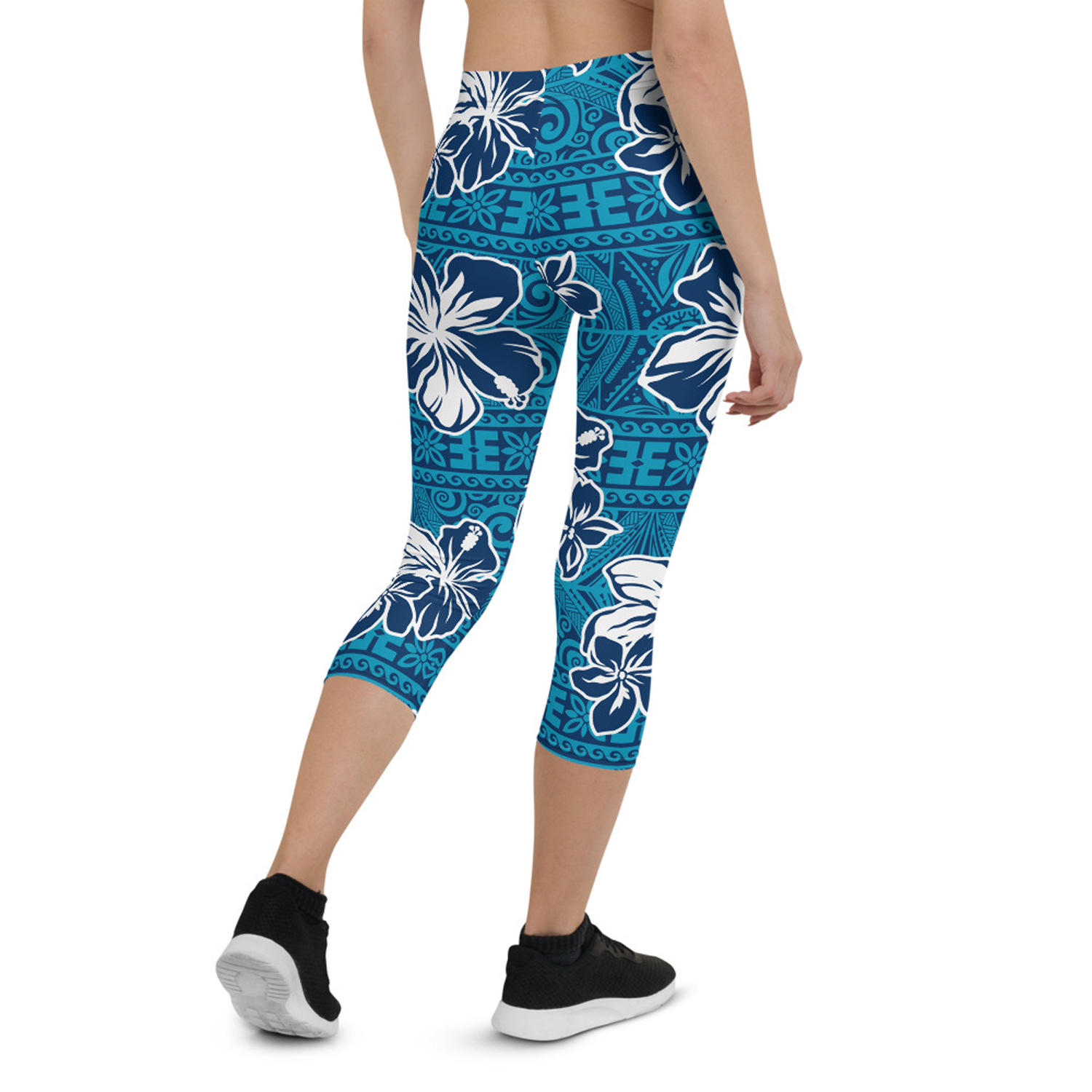 Women's Hawaii Hibiscus Blue Floral Capri Leggings featuring a vibrant floral design, perfect for workouts and casual wear.