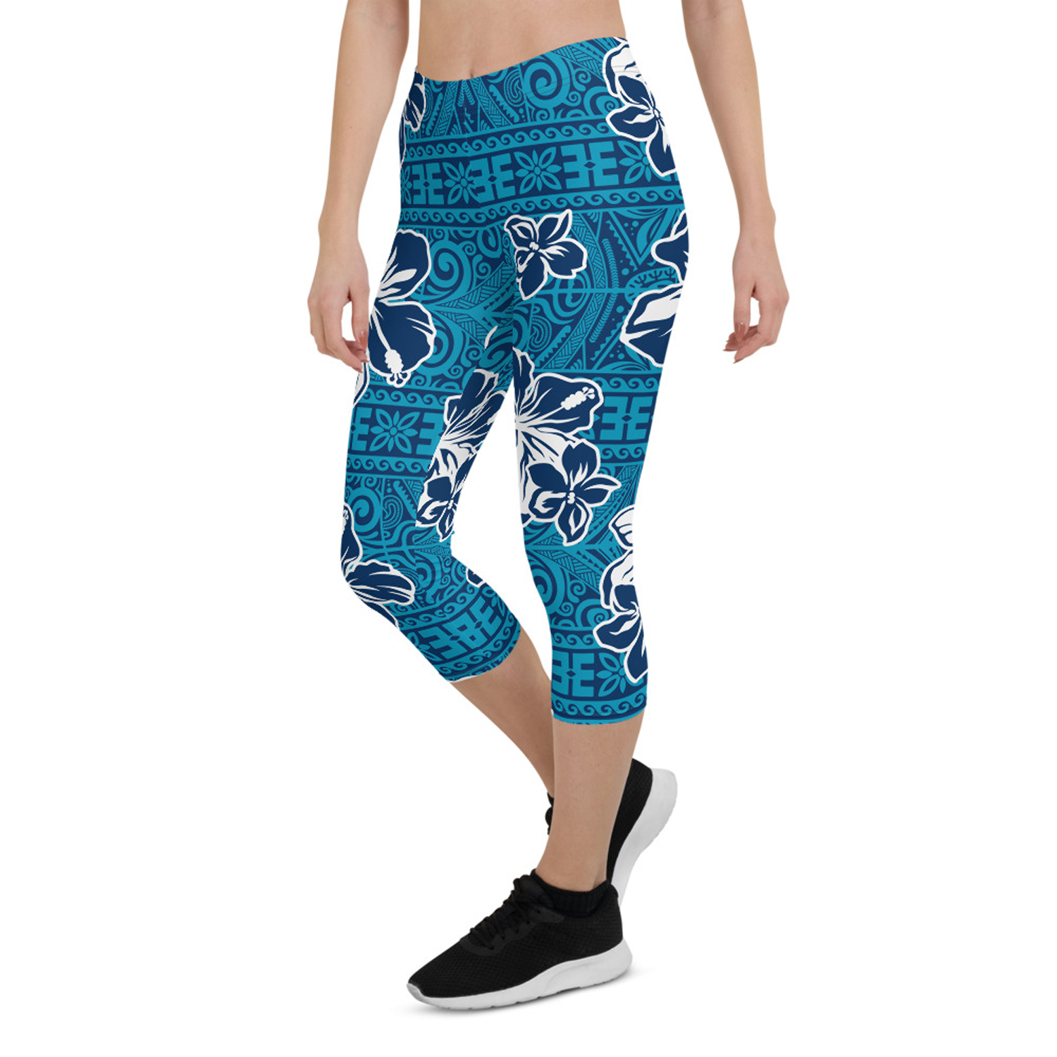 Women's Hawaii Hibiscus Blue Floral Capri Leggings featuring a vibrant floral design, perfect for workouts and casual wear.