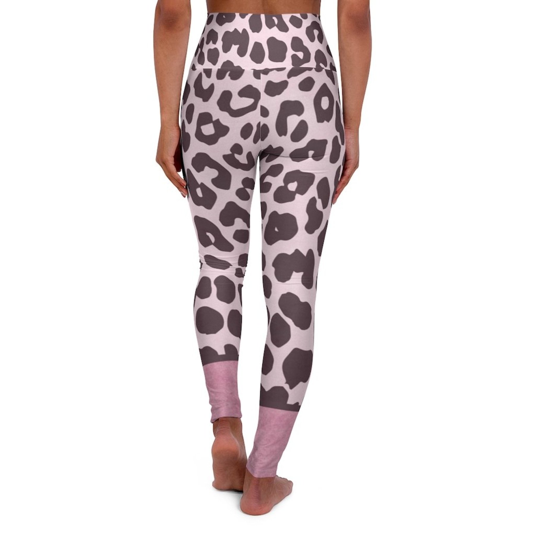 Women's high waist fitness leggings in heather pink leopard style, showcasing a stylish design and stretchy fabric.