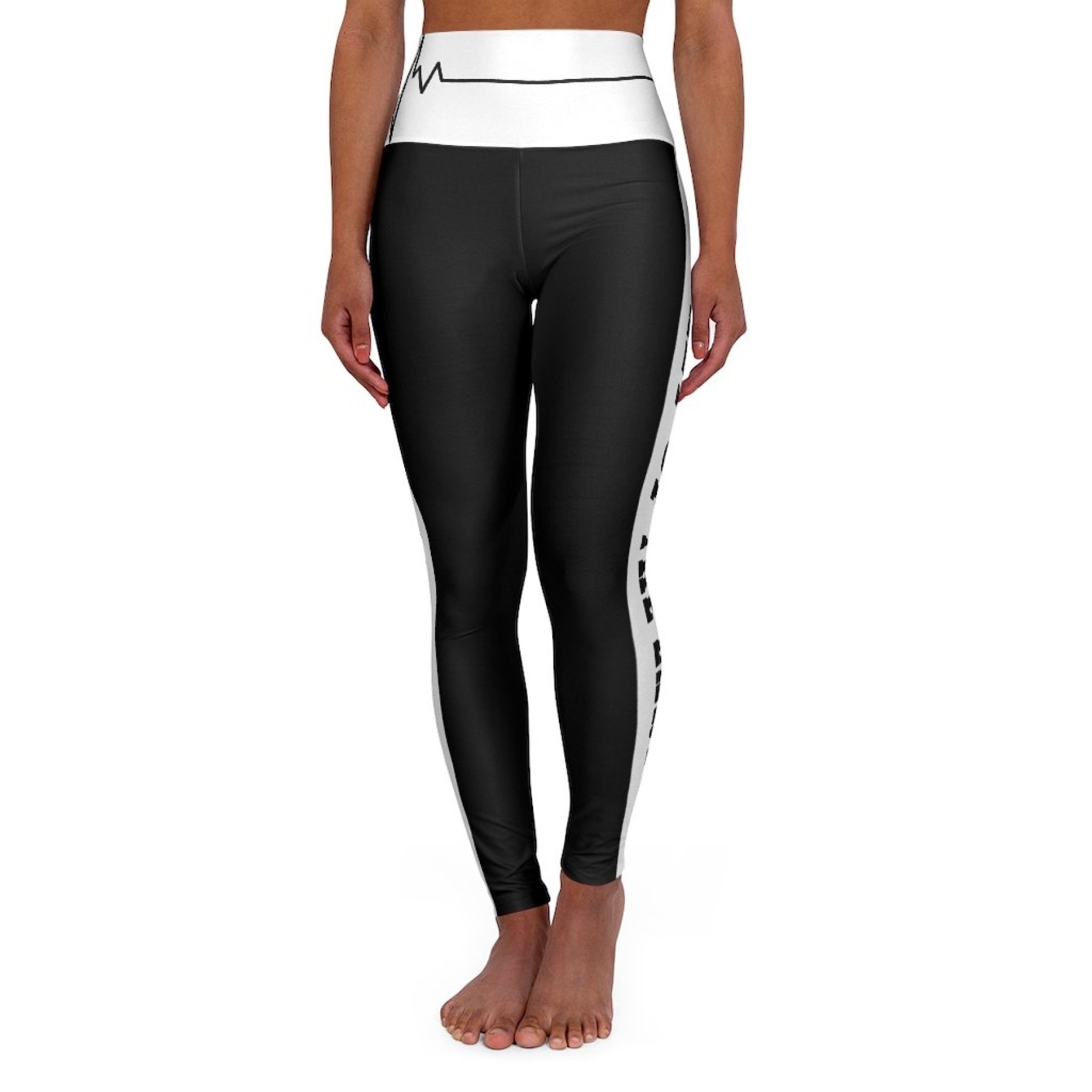 Women's high-waist fitness leggings in black and white, showcasing a flattering design and stretchy fabric, perfect for workouts.