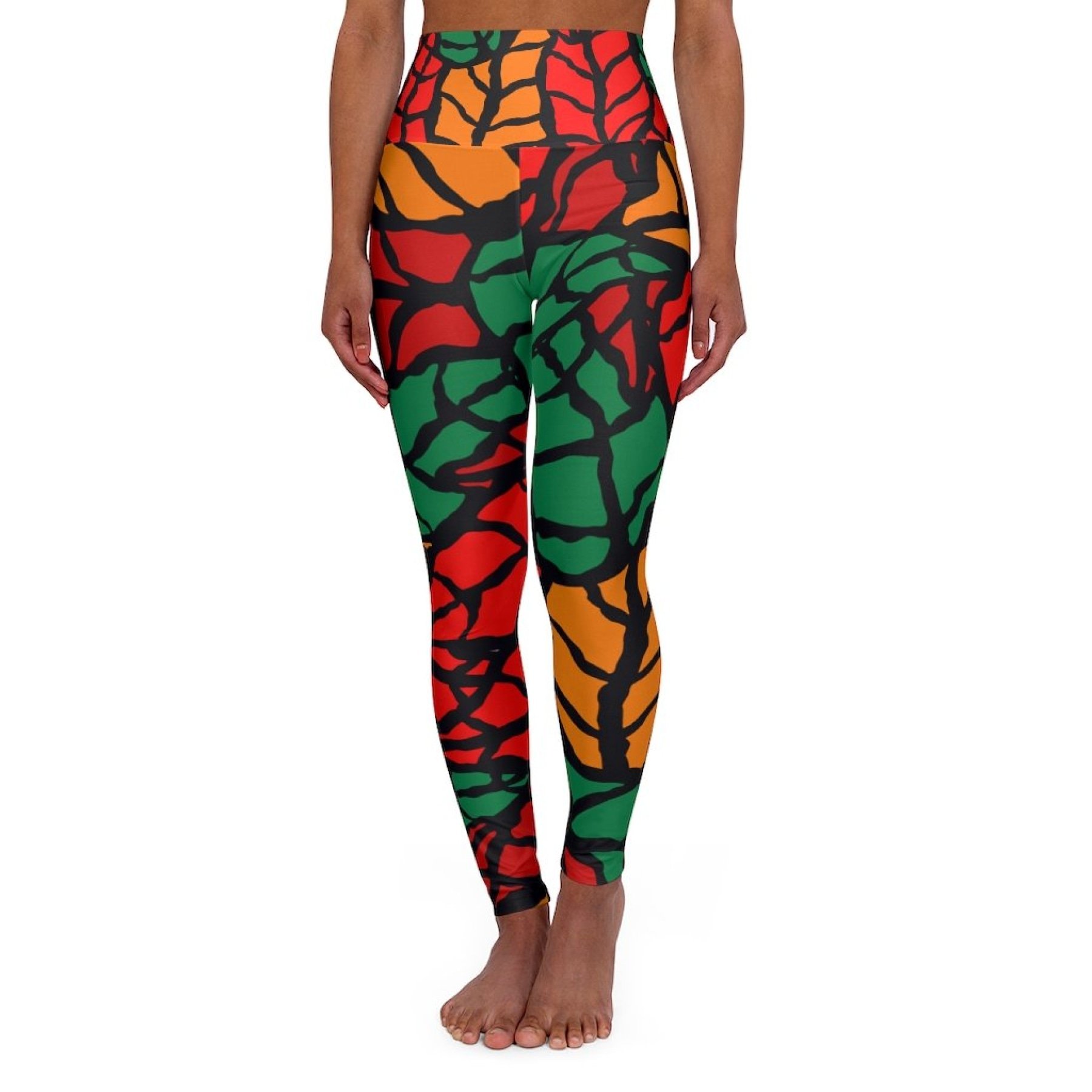 Womens high-waist fitness legging yoga pants in red green autumn leaf design, showcasing a stylish and flattering fit.