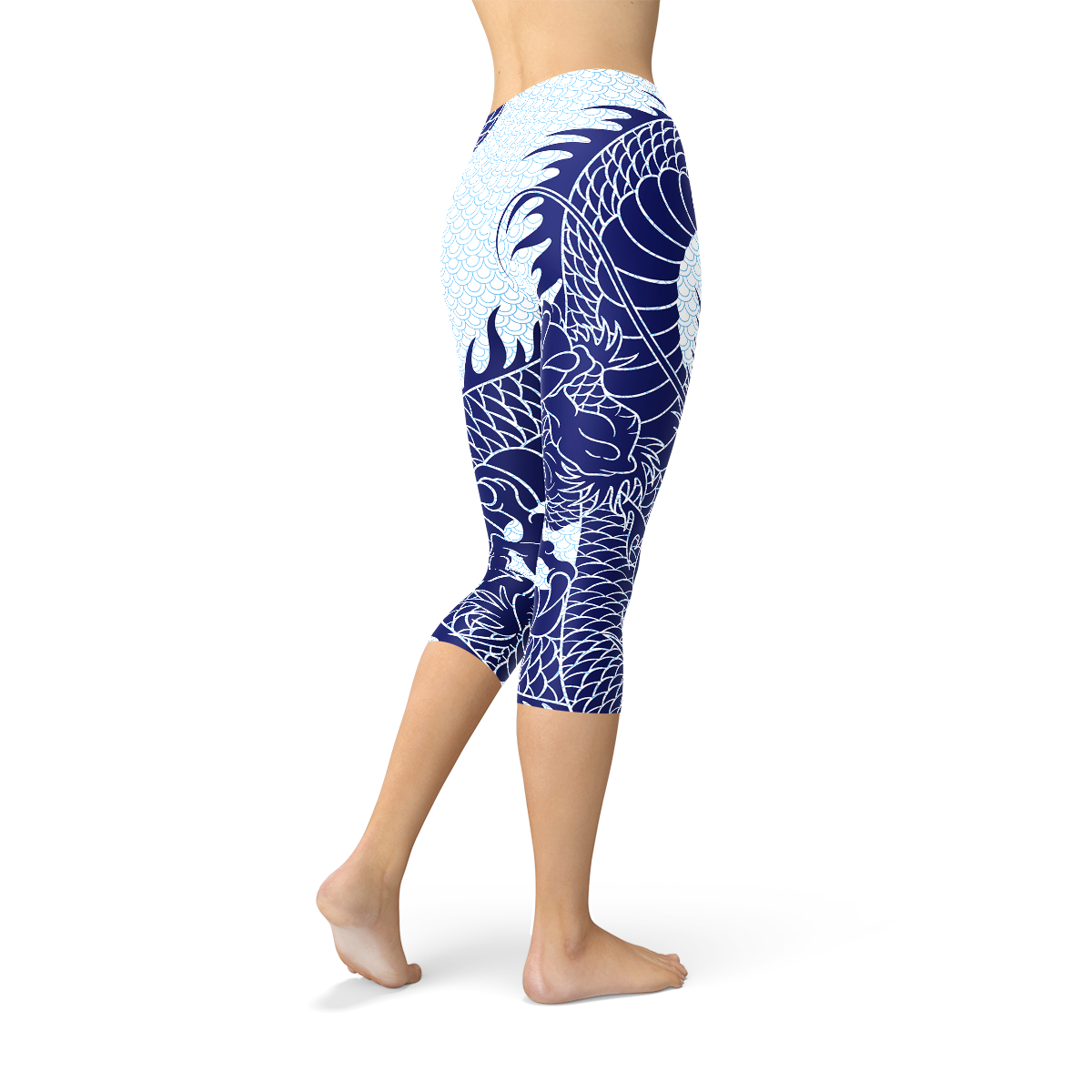 Womens Japanese Dragon Capri Leggings featuring a vibrant dragon tattoo design on a pastel blue scale background, ideal for workouts and casual wear.