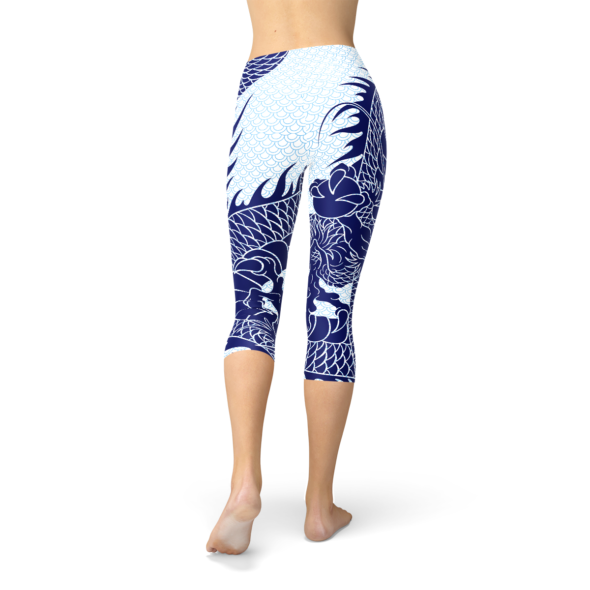 Womens Japanese Dragon Capri Leggings featuring a vibrant dragon tattoo design on a pastel blue scale background, ideal for workouts and casual wear.