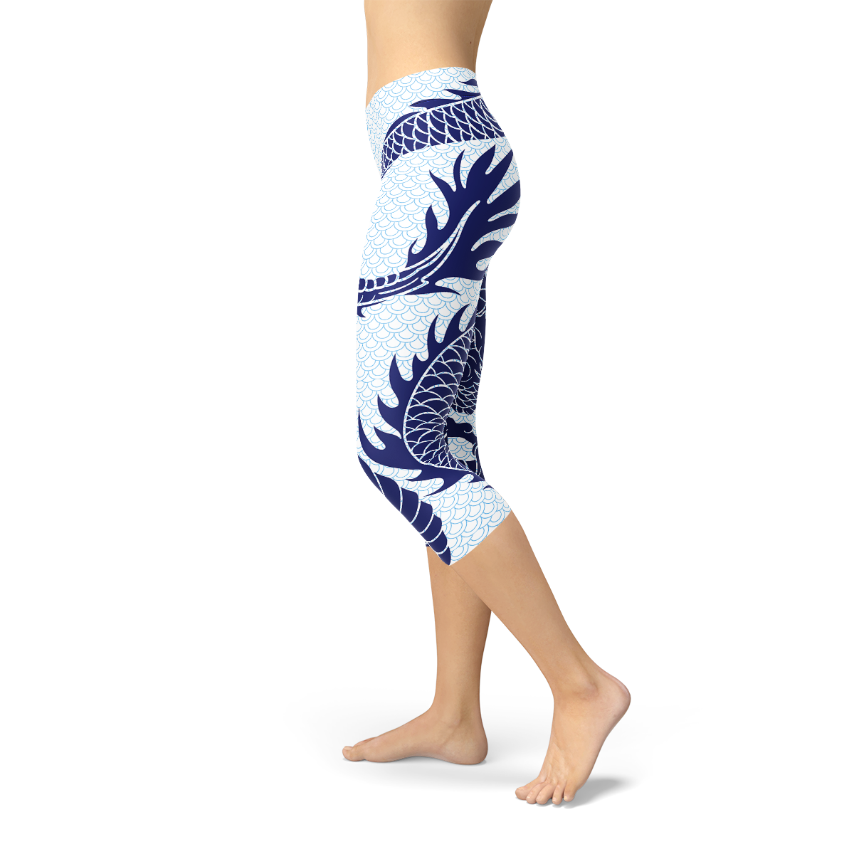 Womens Japanese Dragon Capri Leggings featuring a vibrant dragon tattoo design on a pastel blue scale background, ideal for workouts and casual wear.