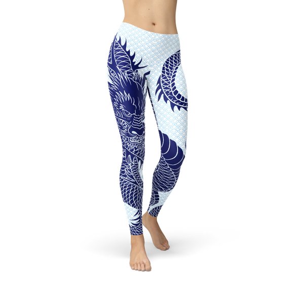 Womens Japanese Dragon Leggings featuring a dragon tattoo design and pastel blue dragon scale background, perfect for workouts and casual wear.