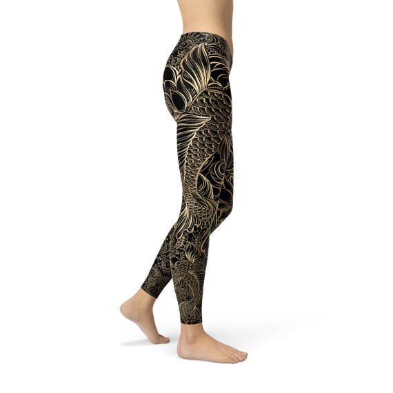 A pair of Womens Koi Fish Black Leggings featuring a vibrant koi fish graphic design, made from a comfortable and stretchy fabric blend.