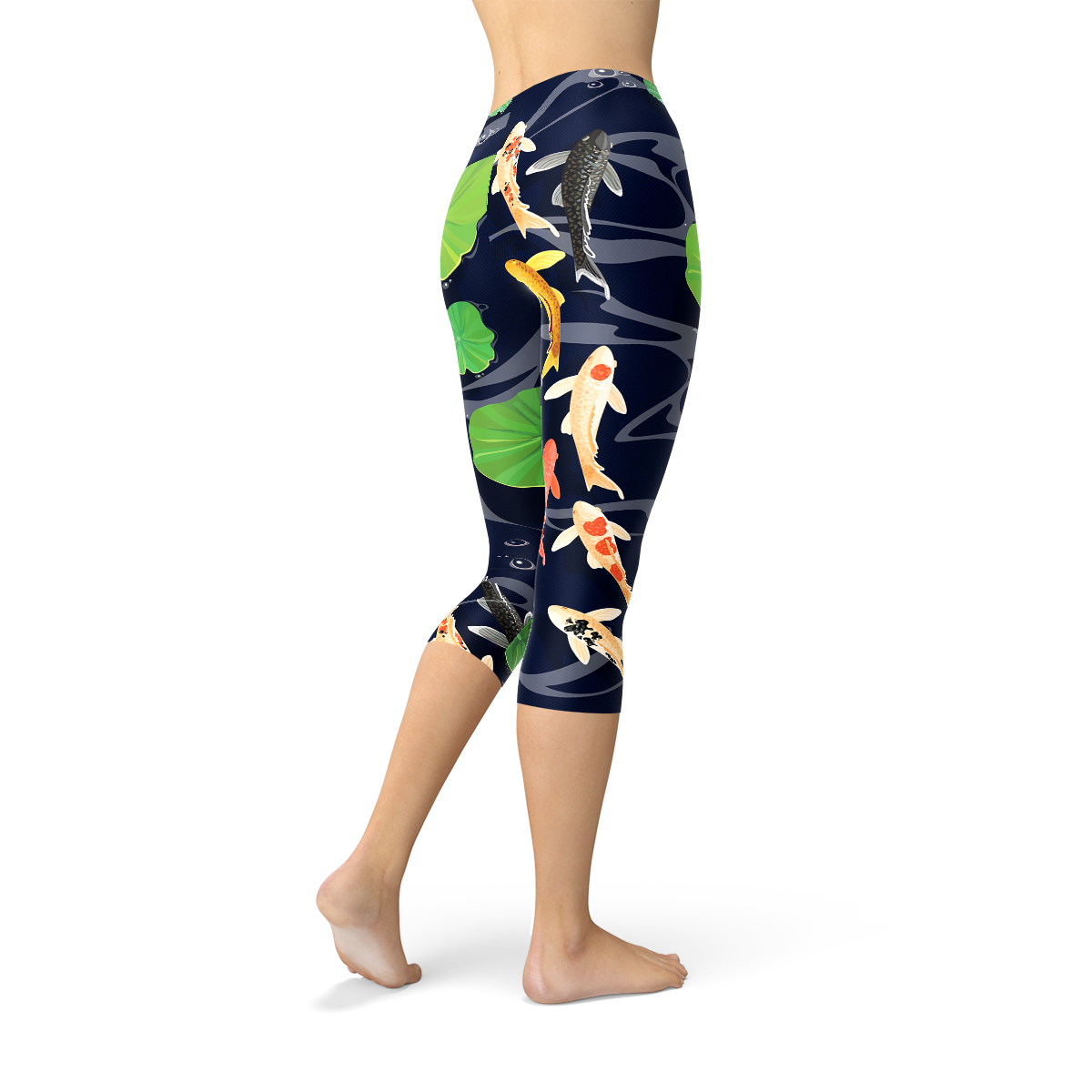 A pair of women's capri leggings featuring a vibrant koi fish design in a serene pond setting, showcasing the unique print and high-quality fabric.