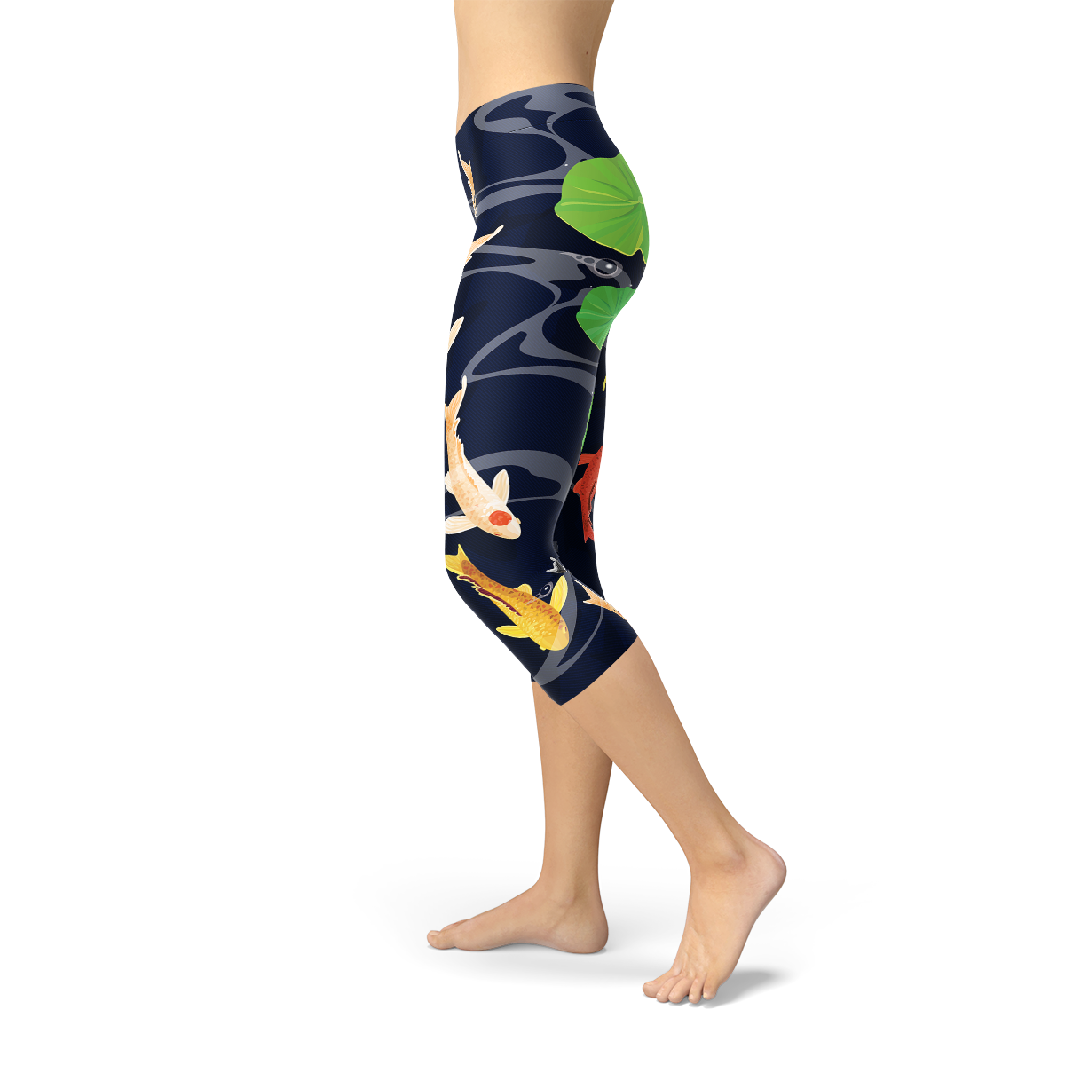 A pair of women's capri leggings featuring a vibrant koi fish design in a serene pond setting, showcasing the unique print and high-quality fabric.