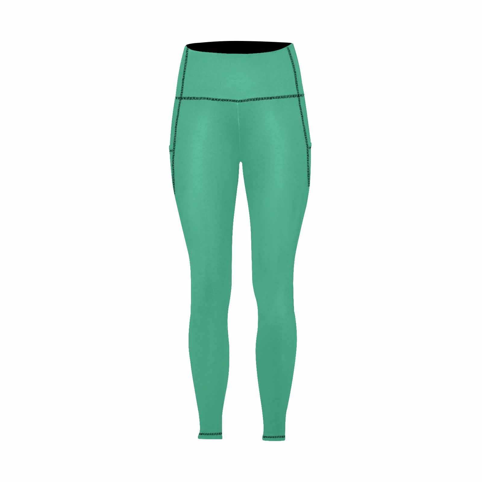 Mint green women's leggings with pockets, showcasing a soft and lightweight fabric, perfect for fitness activities.