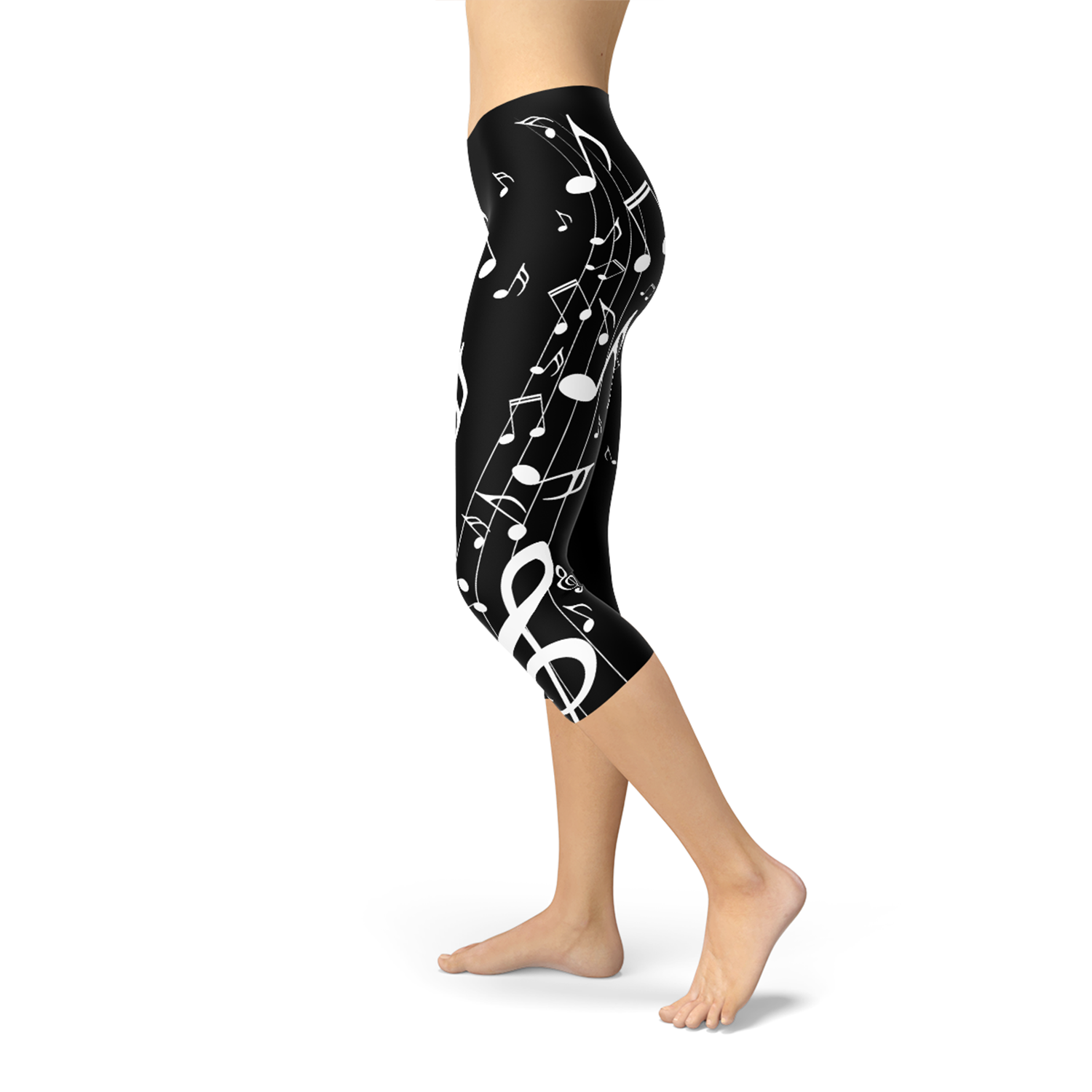 Women's Piano Notes Black Capri Leggings featuring a unique piano notes design, perfect for workouts and casual wear.