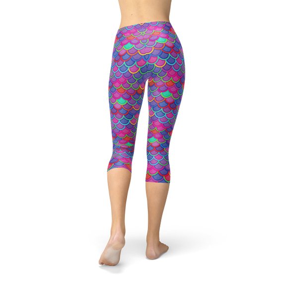 Women's Purple Pink Mermaid Capri Leggings featuring a vibrant mermaid design, perfect for workouts and casual wear.