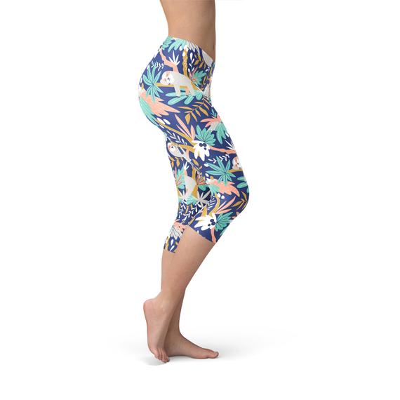 A pair of Women's Sloth Capri Leggings featuring vibrant sloth graphics, designed for comfort and performance, showcasing a four-way stretch fabric.