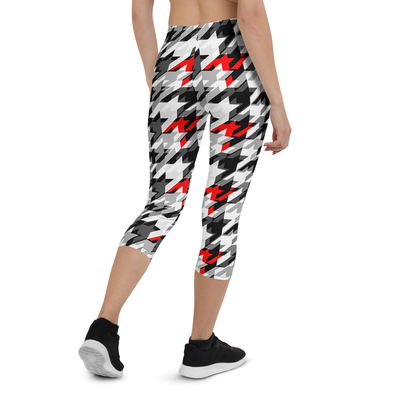 Women's Sports Houndstooth Capri Leggings featuring a unique houndstooth pattern, designed for comfort and performance during workouts.