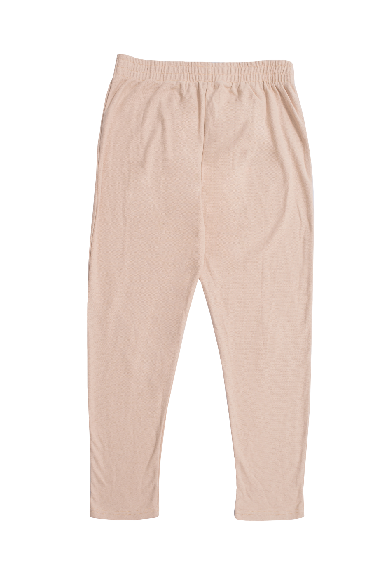 A pair of women's straight fit trousers made from a honeycomb pique cotton blend, featuring an elasticated waistband and a sleek silhouette.