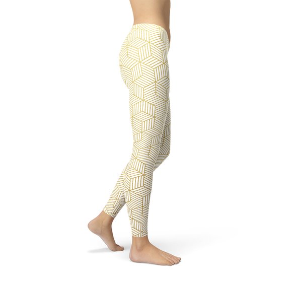 Women's white leggings featuring a unique geometric cube design, perfect for workouts and casual wear, showcasing a stylish and comfortable fit.