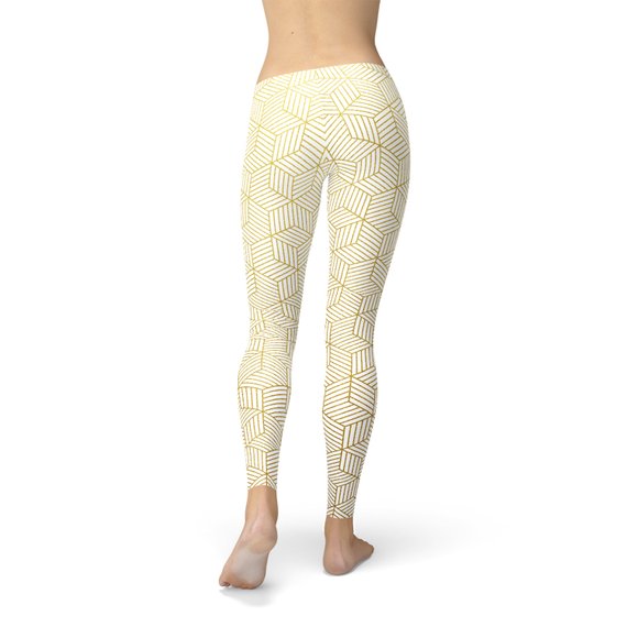 Women's white leggings featuring a unique geometric cube design, perfect for workouts and casual wear, showcasing a stylish and comfortable fit.