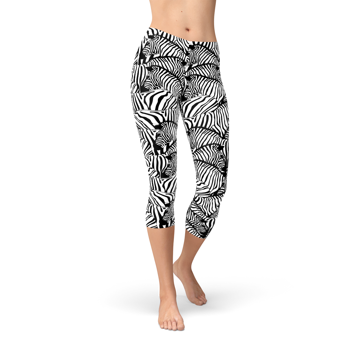 A pair of women's zebra stripe capri leggings featuring a unique design, made from a high-performance fabric blend for comfort and flexibility.