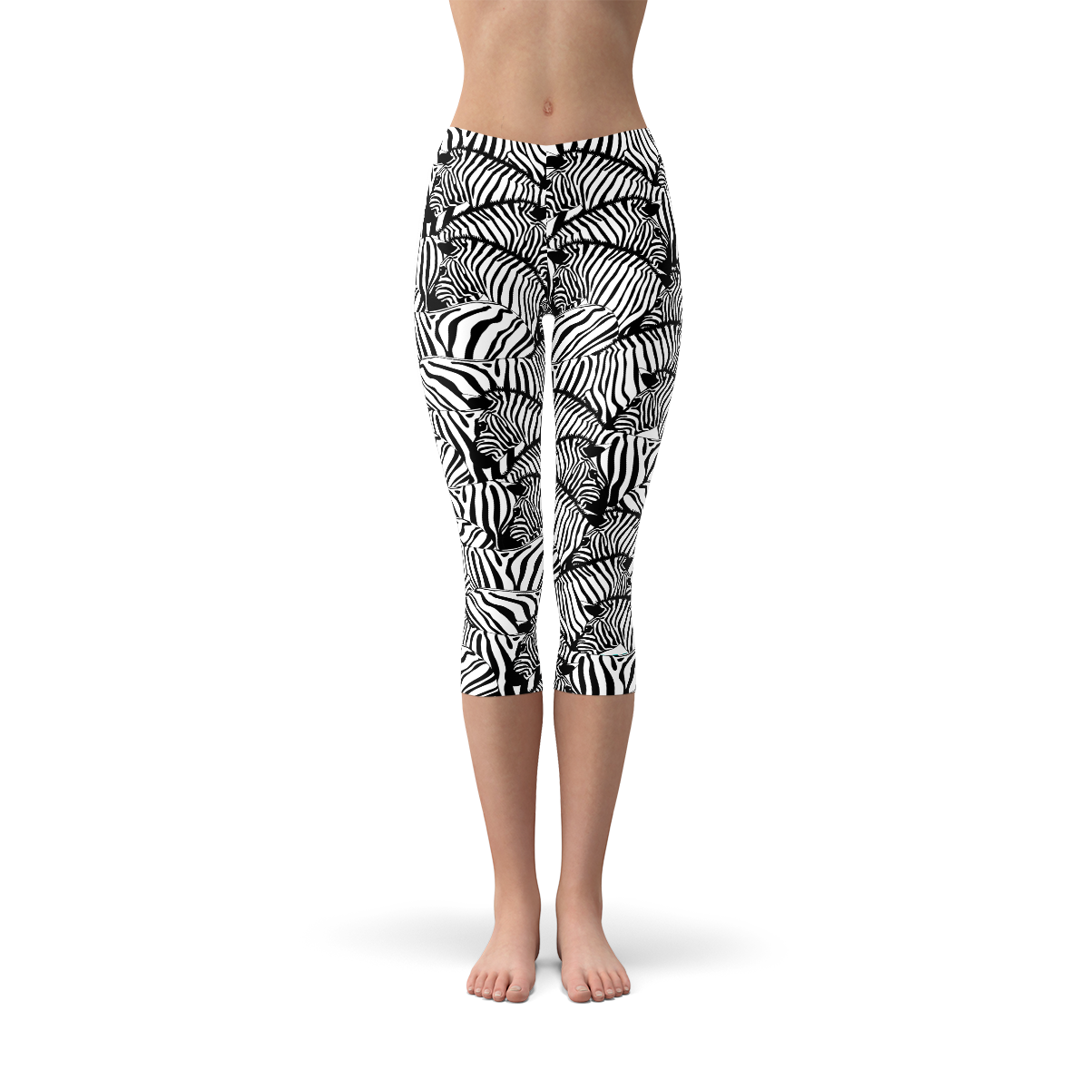 A pair of women's zebra stripe capri leggings featuring a unique design, made from a high-performance fabric blend for comfort and flexibility.