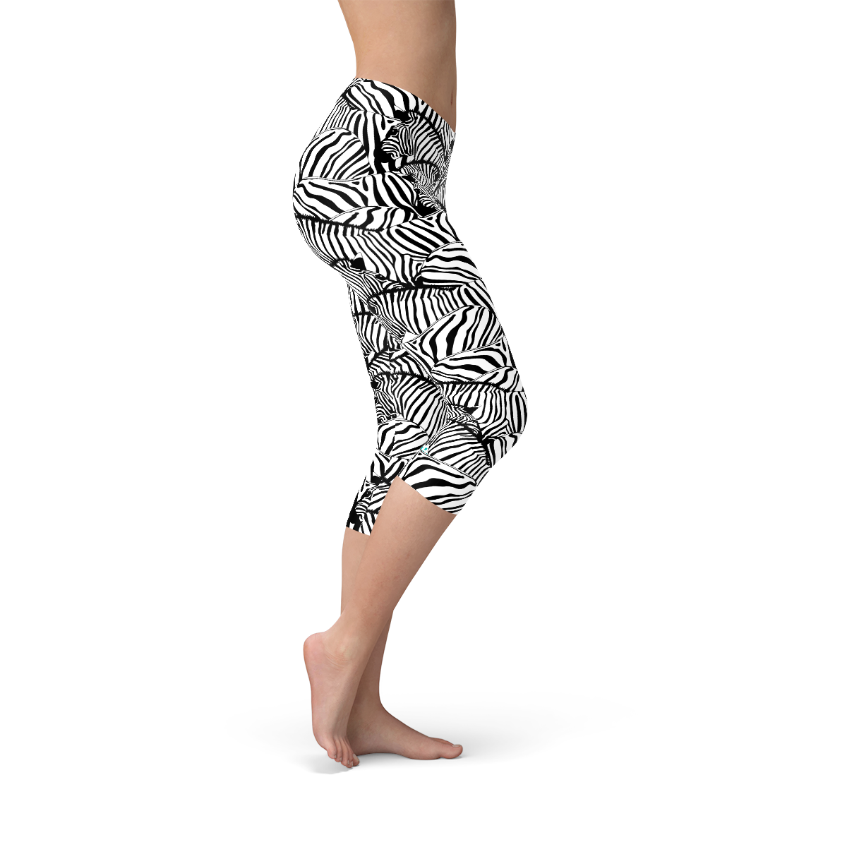 A pair of women's zebra stripe capri leggings featuring a unique design, made from a high-performance fabric blend for comfort and flexibility.