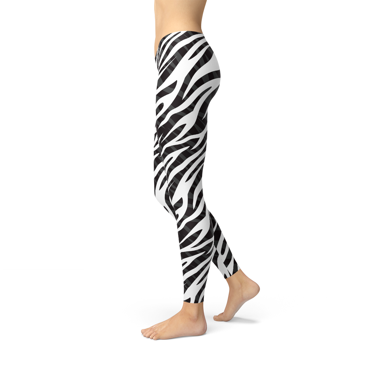 A pair of Womens Zebra Stripes Leggings featuring a bold black and white zebra print design, perfect for workouts and casual wear.