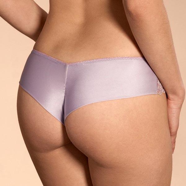 Ajour Daisy Lace Brazilian Panty in light purple, featuring soft semi-sheer lace and a Brazilian cut for ideal back coverage.