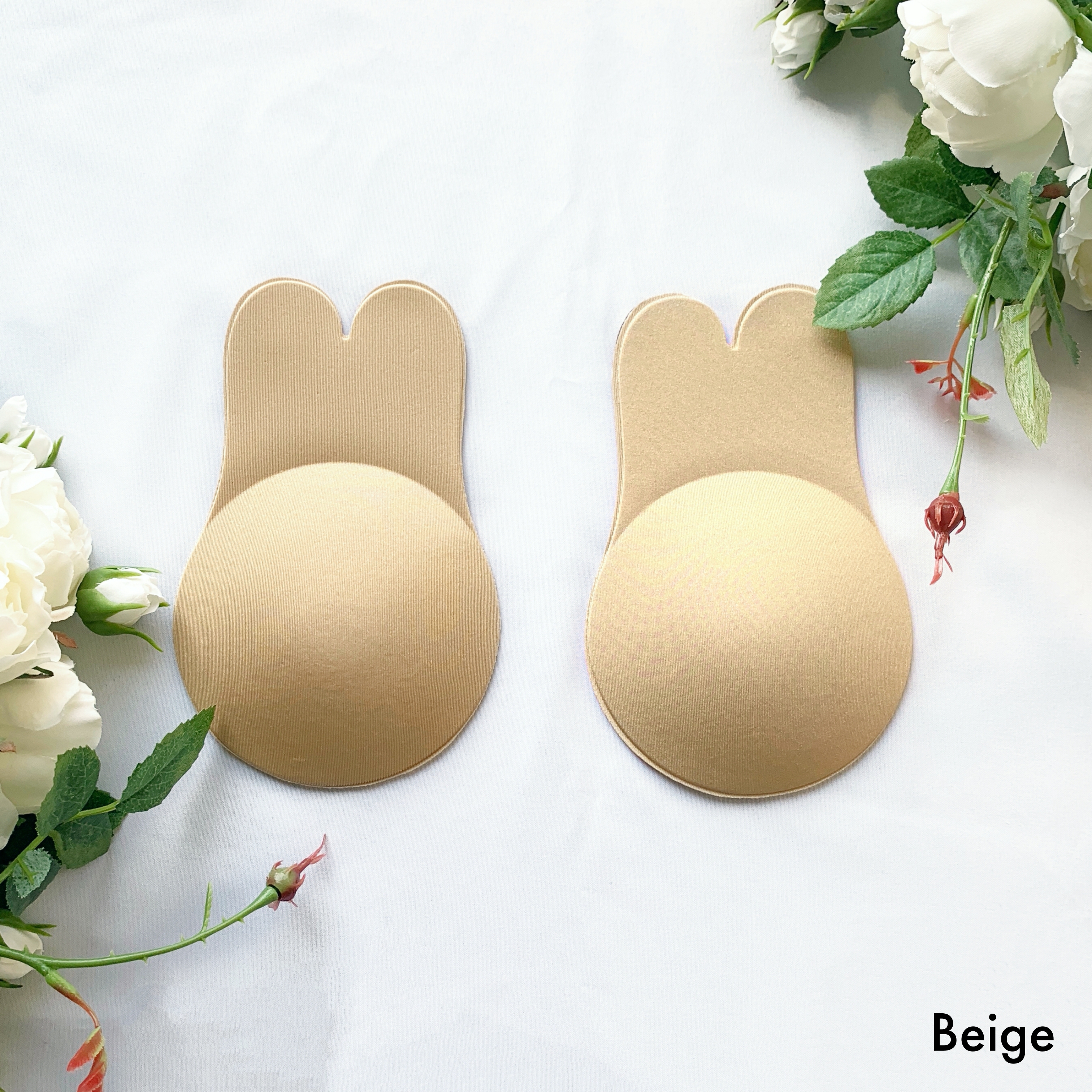 Beige Bunny Lift Bra showcasing its flexible cups and pull-tab design for customizable lift.