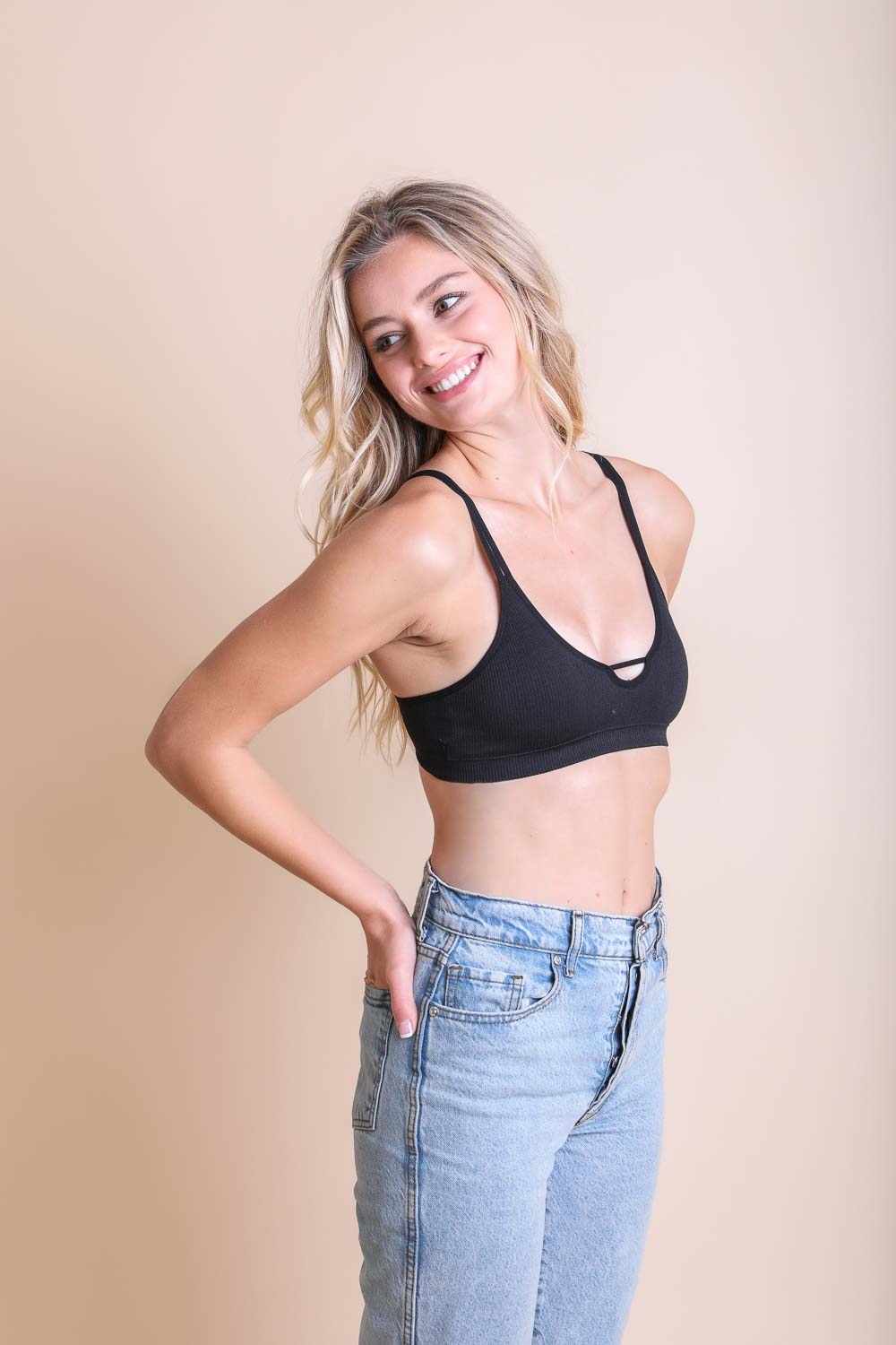 A soft, stretchy ribbed bralette featuring a stylish keyhole accent at the front, adjustable straps, and a comfortable fit.