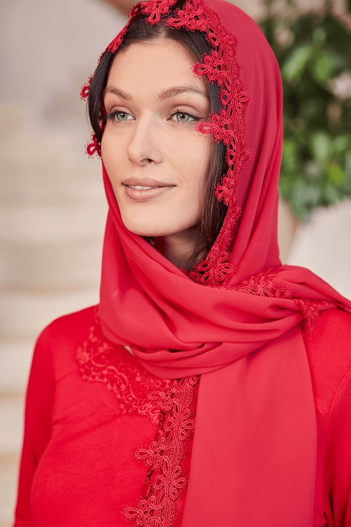 Shopymommy 0029 Red Chiffon Scarf draped elegantly, showcasing its vibrant color and lightweight fabric.