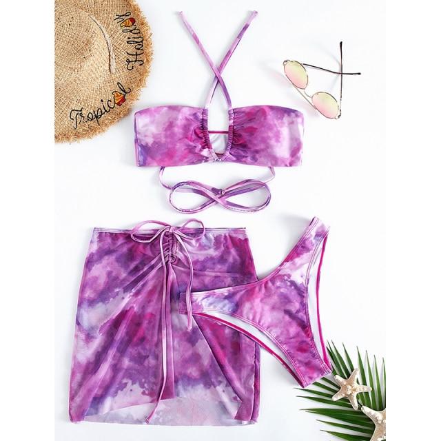 Bandeau bikini set in vibrant pink print, featuring a stylish top and matching bottom, perfect for summer beach outings.