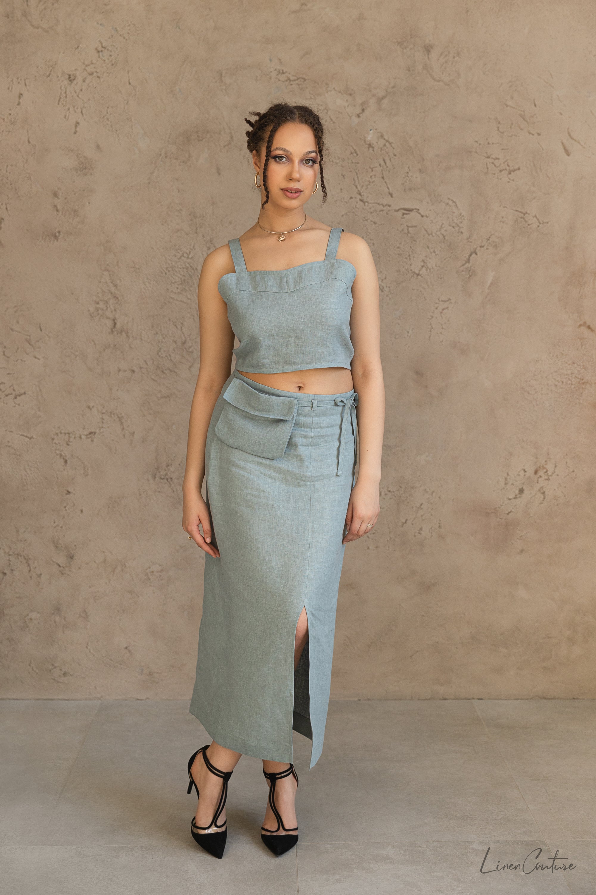 Bella Vita Set in Greyish Mint featuring a sweetheart crop top and midi skirt, showcasing its elegant design and soft linen fabric.