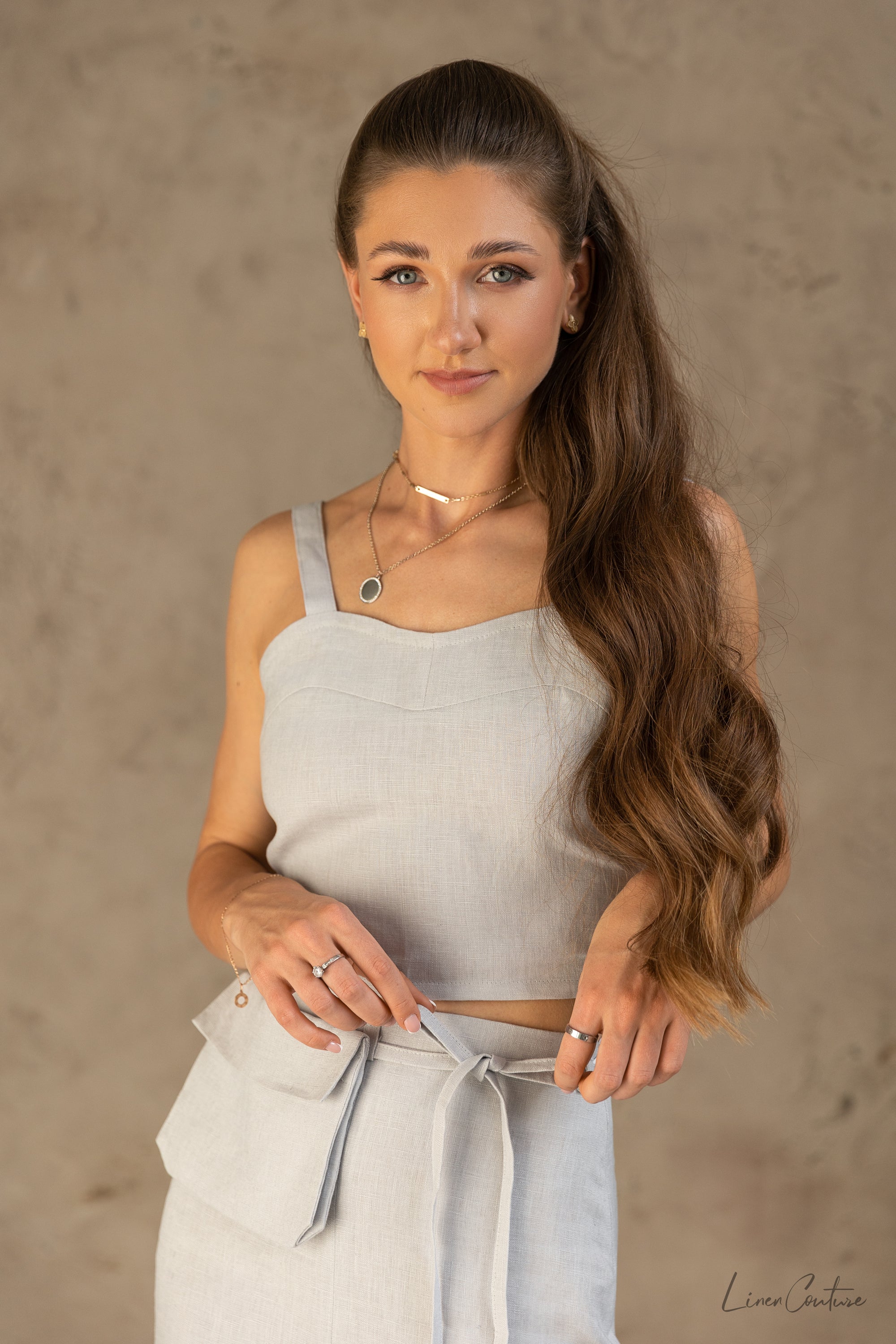 Bella Vita Set in Light Grey featuring a sweetheart crop top and midi skirt made from 100% European linen, elegantly displayed on a model.